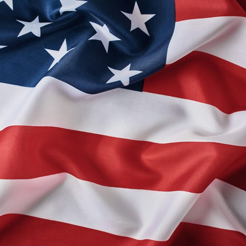 American flag background. USA flag waving, closeup